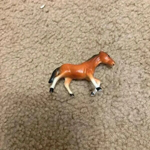 Vintage porcelain horse bay mare, roughly 1.5 Inches Tall